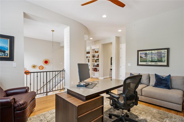 7834 Vallagio Ln, Englewood, CO 80112 - office area with light wood-style flooring, a ceiling fan, and recessed lighting