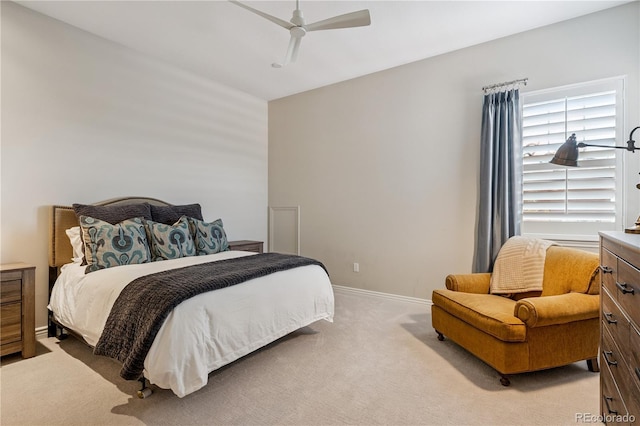 7834 Vallagio Ln, Englewood, CO 80112 - bedroom with light carpet and ceiling fan