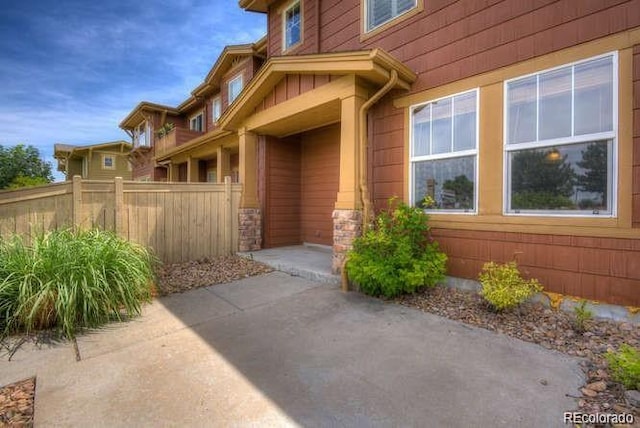 property entrance with a patio