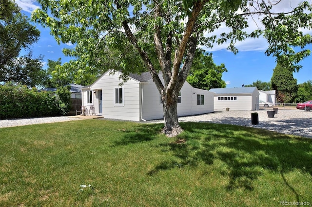 exterior space with fence and a front yard