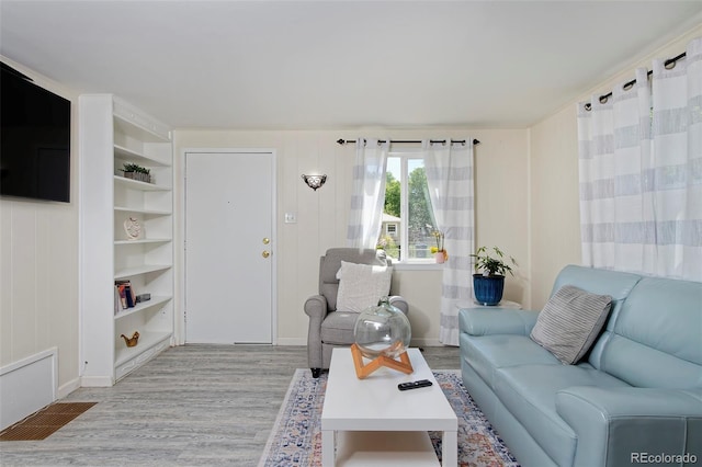 living room with light wood-style floors