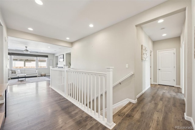 hall with dark hardwood / wood-style flooring