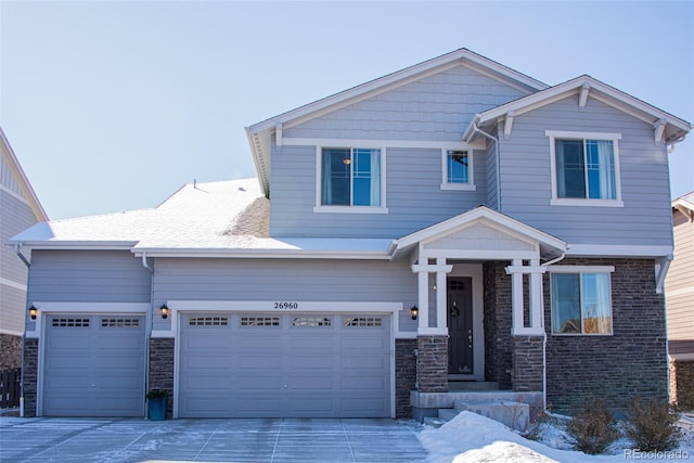 craftsman-style home with a garage