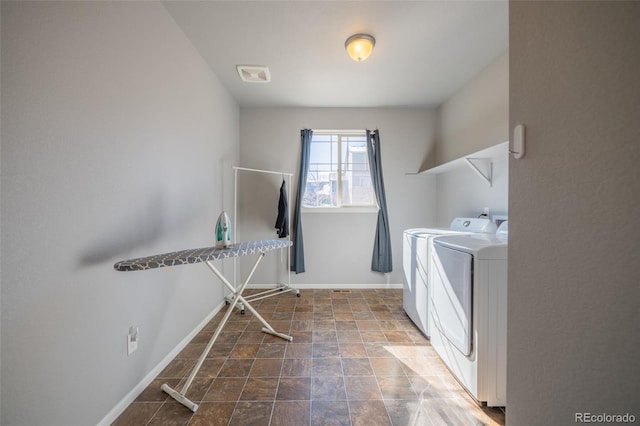 washroom featuring separate washer and dryer