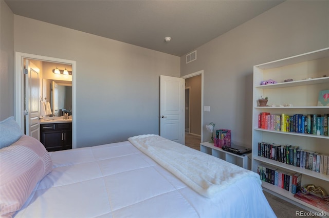 bedroom with ensuite bath