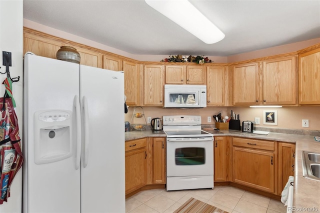 3755 Hartsock Ln Unit 102, Colorado Springs, CO 80917 - kitchen featuring white appliances, light tile patterned floors, light countertops, and a sink
