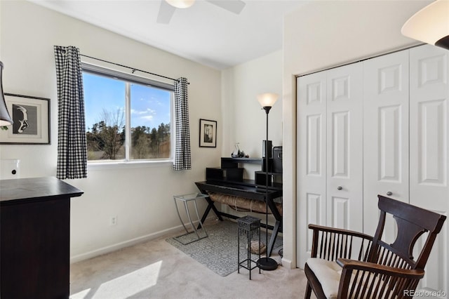 3755 Hartsock Ln Unit 102, Colorado Springs, CO 80917 - living area featuring carpet flooring, a ceiling fan, and baseboards
