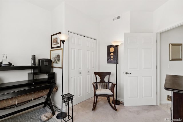 3755 Hartsock Ln Unit 102, Colorado Springs, CO 80917 - living area featuring light carpet and baseboards