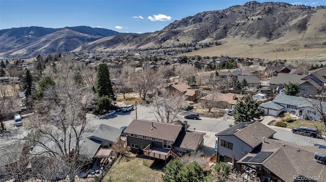 aerial view with a mountain view and a residential view