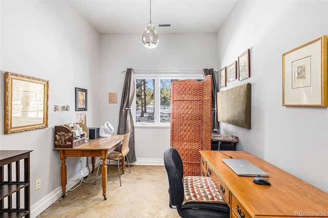 office area featuring visible vents and baseboards