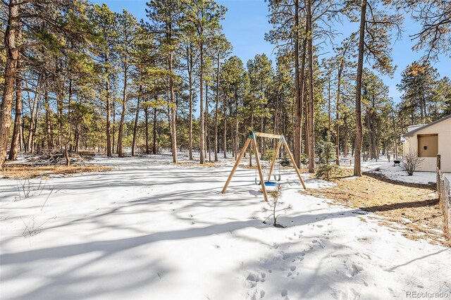 snow covered playground with playground community