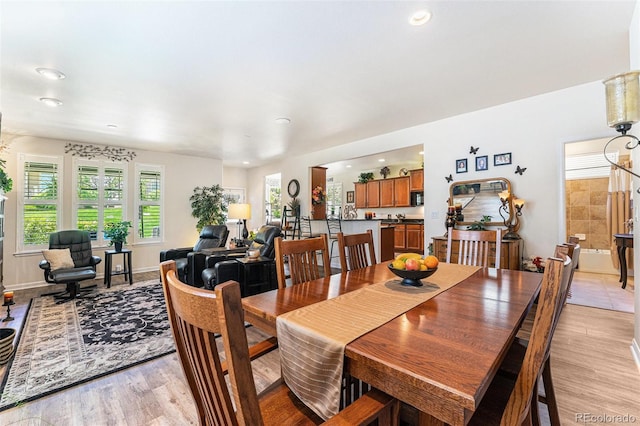 19780 W 57th Ln, Golden, CO 80403 - dining room with light wood-style floors, recessed lighting, and baseboards