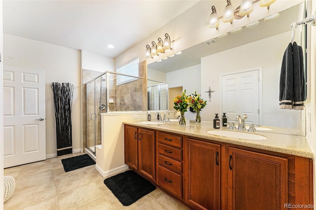 19780 W 57th Ln, Golden, CO 80403 - full bathroom with double vanity, a shower stall, and tile patterned floors