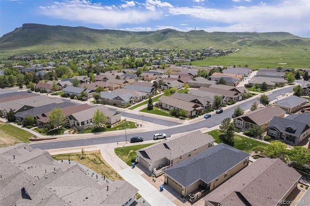 19780 W 57th Ln, Golden, CO 80403 - aerial view of residential area with a mountain backdrop