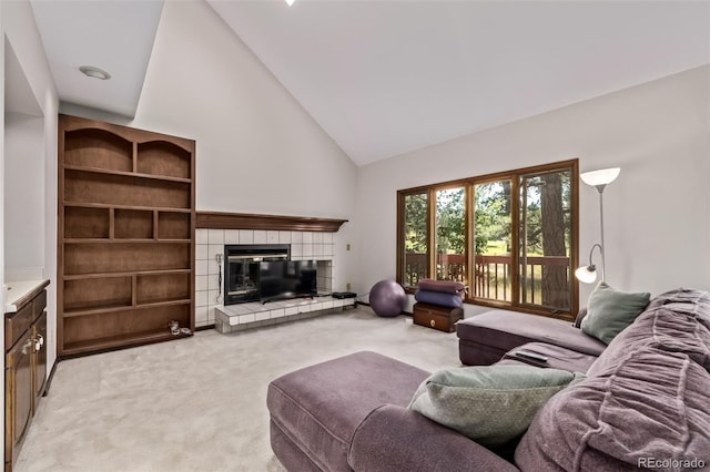 9420 Mcgill Ct, Parker, CO 80134 - living room featuring light colored carpet, a tiled fireplace, and high vaulted ceiling