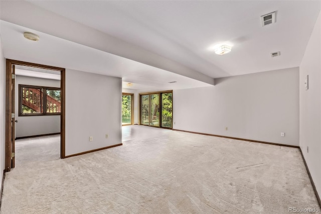 9420 Mcgill Ct, Parker, CO 80134 - empty room with a smoke detector, healthy amount of natural light, and light carpet
