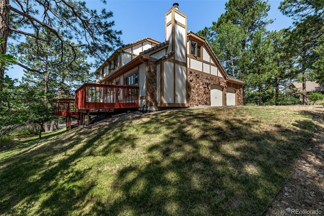 9420 Mcgill Ct, Parker, CO 80134 - rear view of property with a chimney, stone siding, a deck, and a lawn