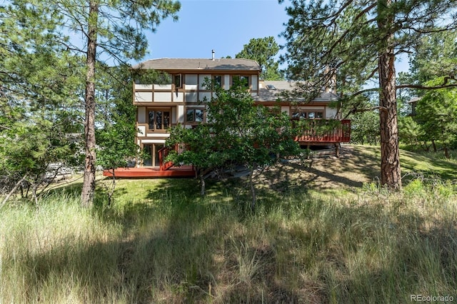 9420 Mcgill Ct, Parker, CO 80134 - rear view of house with a wooden deck