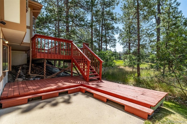 9420 Mcgill Ct, Parker, CO 80134 - wooden terrace featuring stairway and view of wooded area