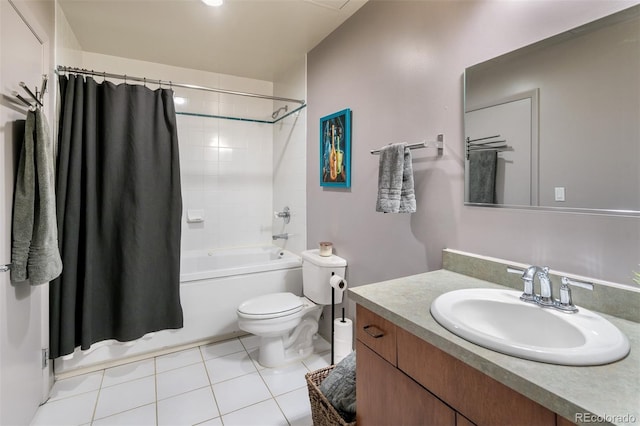 full bathroom featuring toilet, tile patterned floors, vanity, and shower / tub combo with curtain