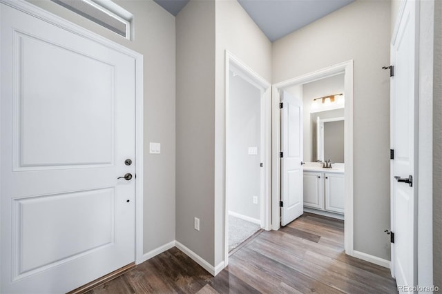 4947 N Quatar St, Aurora, CO 80019 - foyer with dark wood finished floors and baseboards