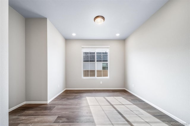 4947 N Quatar St, Aurora, CO 80019 - unfurnished room featuring wood finished floors and recessed lighting