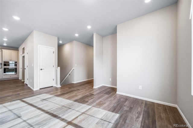 4947 N Quatar St, Aurora, CO 80019 - empty room with wood finished floors and recessed lighting