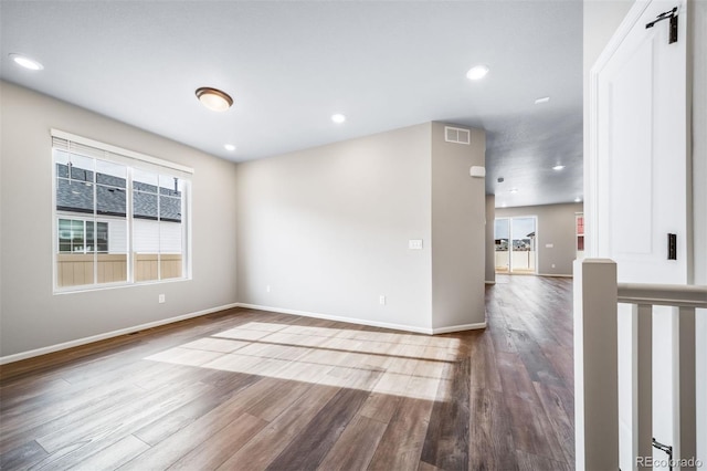 4947 N Quatar St, Aurora, CO 80019 - spare room featuring healthy amount of natural light, wood finished floors, and recessed lighting