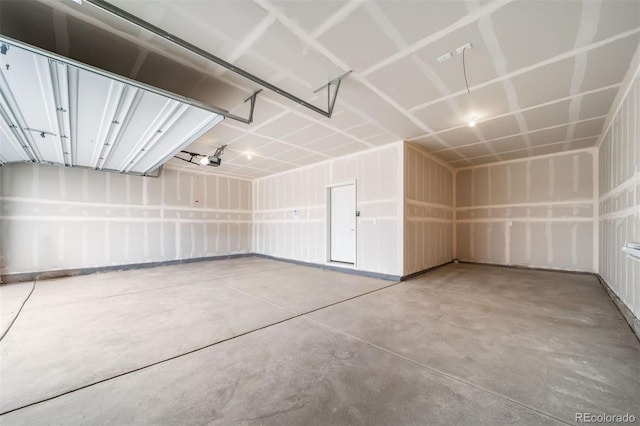 4947 N Quatar St, Aurora, CO 80019 - garage featuring a garage door opener