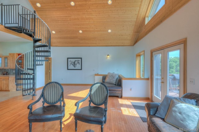 living room with wood ceiling, light hardwood / wood-style flooring, high vaulted ceiling, and french doors