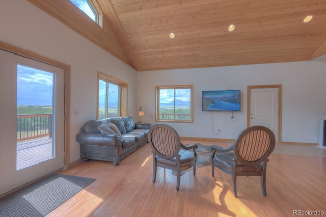 living room with high vaulted ceiling, wooden ceiling, and light wood-type flooring