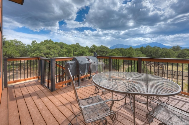 deck featuring area for grilling and a mountain view