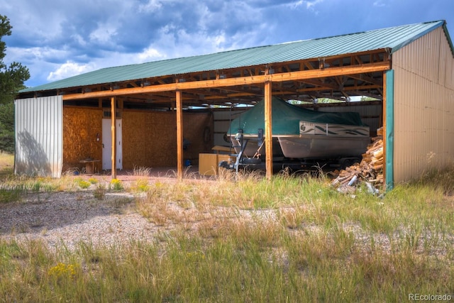 exterior space featuring a carport