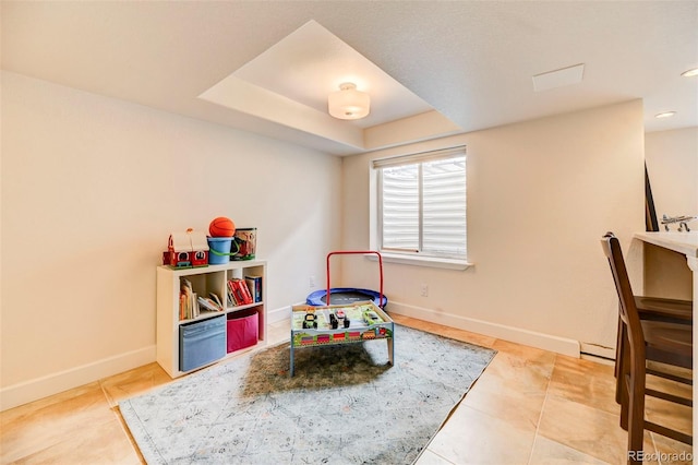 recreation room with tile patterned flooring