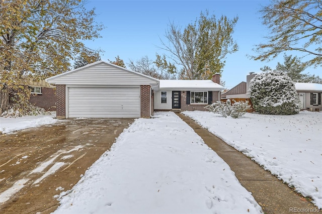 single story home with a garage