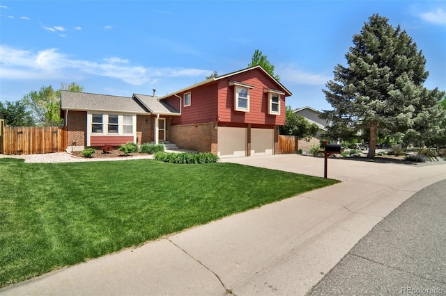 split level home featuring brick siding, a garage, and concrete driveway