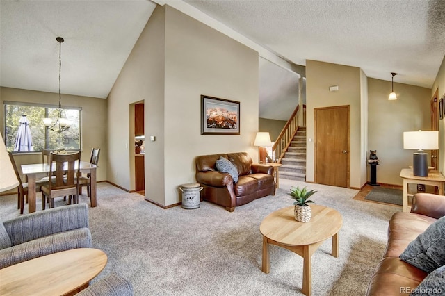 carpeted living area with stairway, a chandelier, baseboards, a textured ceiling, and high vaulted ceiling