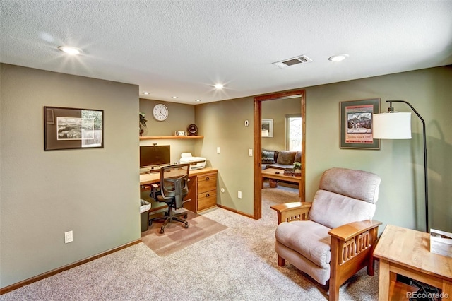 home office featuring light carpet, a textured ceiling, recessed lighting, and baseboards