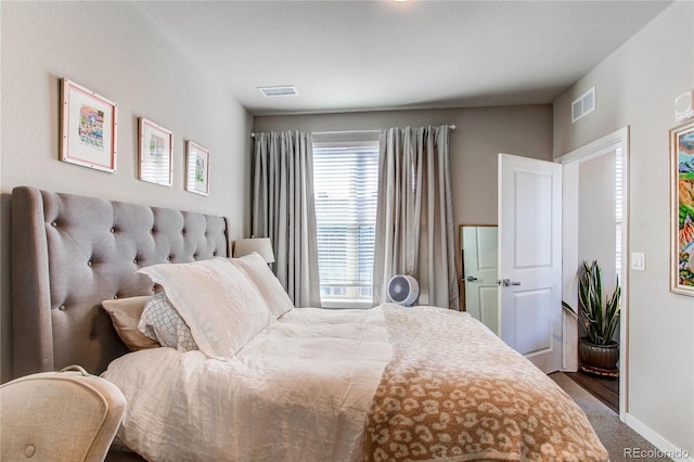 155 S Monaco Street Parkway Unit 311, Denver, CO 80224 - bedroom with baseboards and visible vents