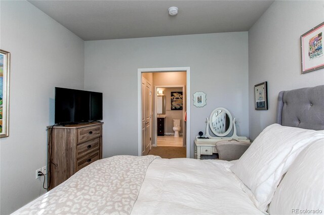 155 S Monaco Street Parkway Unit 311, Denver, CO 80224 - bedroom featuring connected bathroom