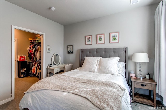 155 S Monaco Street Parkway Unit 311, Denver, CO 80224 - carpeted bedroom with a closet, a walk in closet, and visible vents