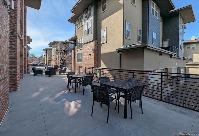 155 S Monaco Street Parkway Unit 311, Denver, CO 80224 - view of patio with outdoor dining space