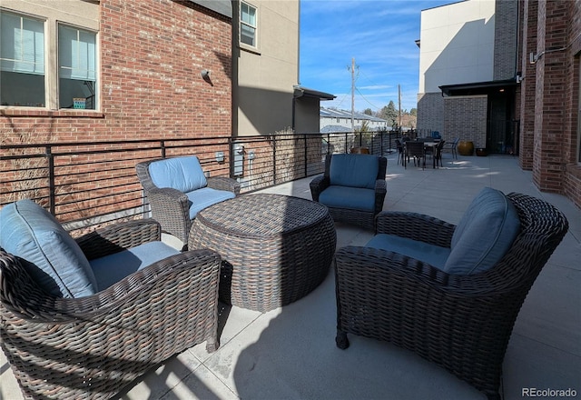 155 S Monaco Street Parkway Unit 311, Denver, CO 80224 - view of patio / terrace featuring outdoor dining space and outdoor lounge area
