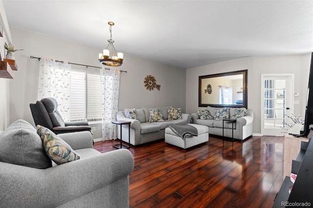 5611 S Sicily Cir, Aurora, CO 80015 - living area with an inviting chandelier, baseboards, and wood finished floors