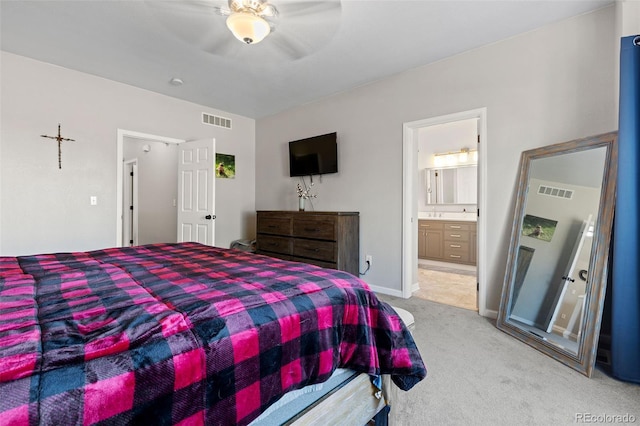5611 S Sicily Cir, Aurora, CO 80015 - bedroom with baseboards, visible vents, light carpet, and ensuite bath