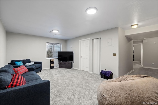 5611 S Sicily Cir, Aurora, CO 80015 - carpeted living room featuring baseboards