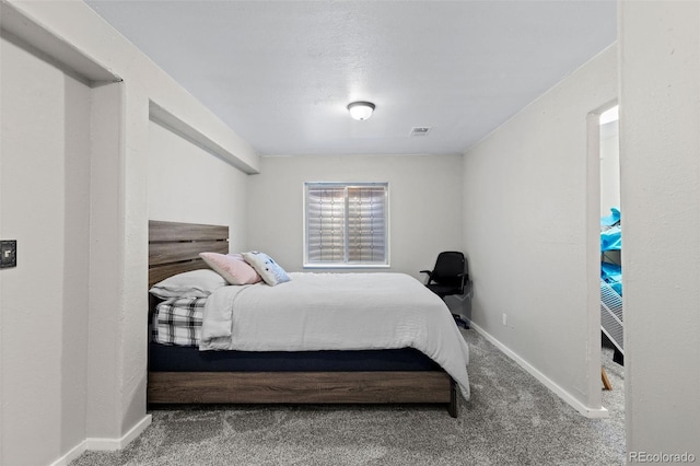 5611 S Sicily Cir, Aurora, CO 80015 - carpeted bedroom with baseboards and visible vents