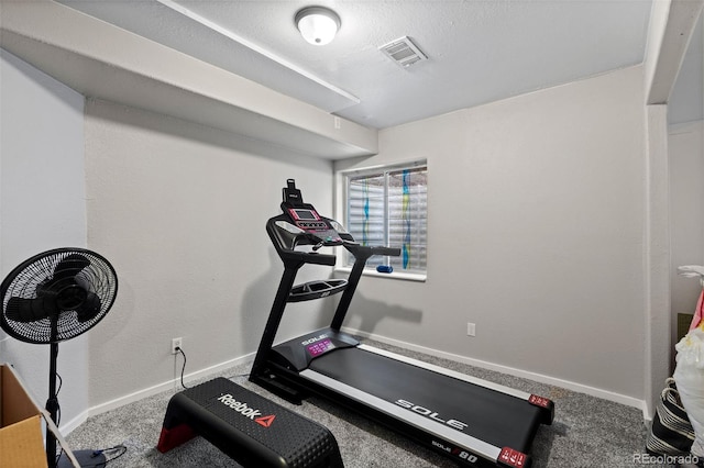 5611 S Sicily Cir, Aurora, CO 80015 - exercise area featuring baseboards, carpet floors, and visible vents