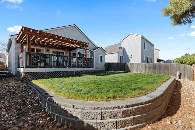 5611 S Sicily Cir, Aurora, CO 80015 - back of house featuring fence, a pergola, a yard, and a deck
