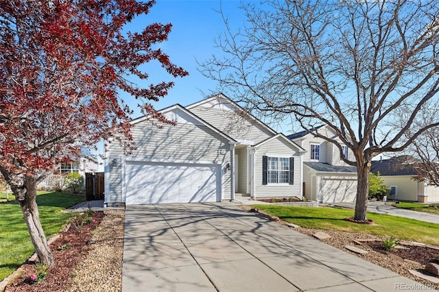 5611 S Sicily Cir, Aurora, CO 80015 - ranch-style home with fence, an attached garage, driveway, and a front lawn